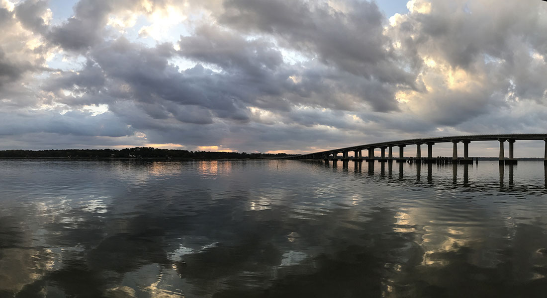 Bridge, River with Dramatic Sky and Dramatic Reflection of Sky